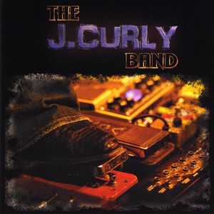 Curly, J.