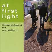 At First Light , John McSherry