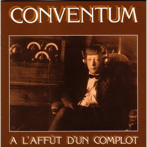 A L'affut D'un Complot [Import]
